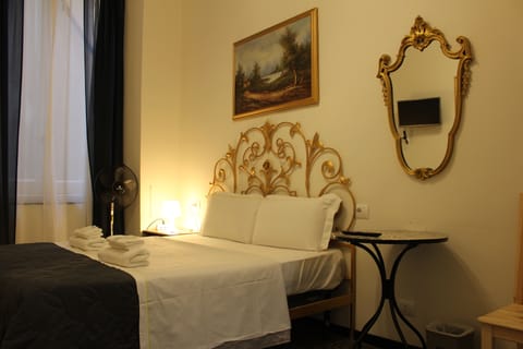 Economy Double Room | Minibar, laptop workspace, WiFi (free), bed sheets