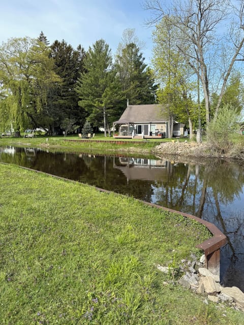 View of cottage from across the river.