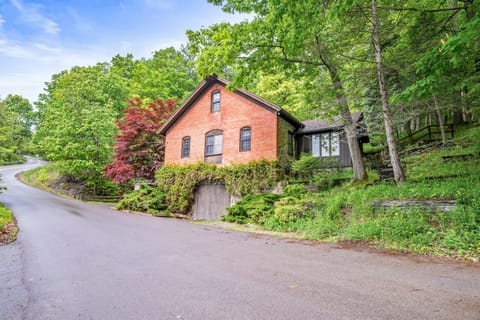 A classic brick and stone facade tucked into natureโcharacter and charm await ๐๐ ๐