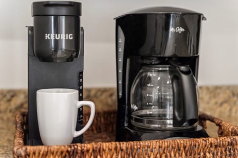 Enjoy coffee with a drip coffee pot, a Keurig machine with starter pods provided, a French Press and Moka Pot