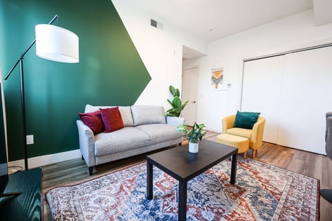 Your alfresco living area, complete with comfortable seating and charming surroundings.