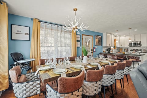 Dining Room: Gather around for unforgettable feasts in this stylish dining haven!