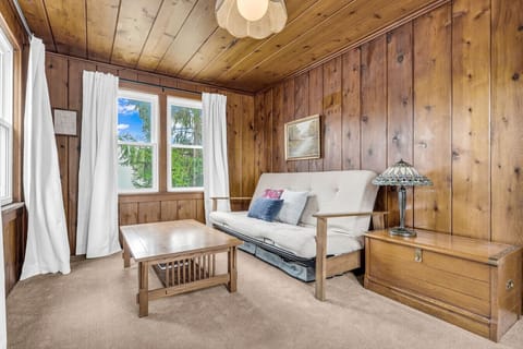 Step into the wood-paneled time machine - vibes set to classic cabin cool.