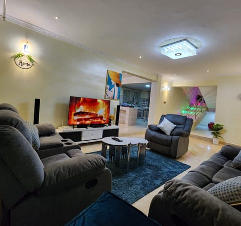 Family Bungalow | Living area | 32-inch Smart TV with digital channels
