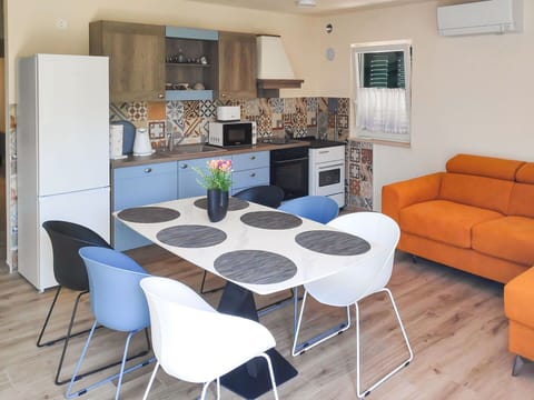 Furniture, Interior Design, Flooring, Floor, Wood, Kitchen, Room, Ceiling, Table, Chair
