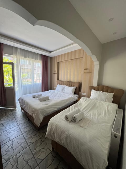 Classic Triple Room, Balcony, City View | View from room