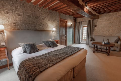 Premium bedding, desk, laptop workspace, blackout drapes