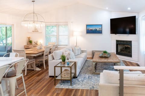 Gorgeous and cozy open living space perfect for gathering together and enjoying the coastal lifestyle.