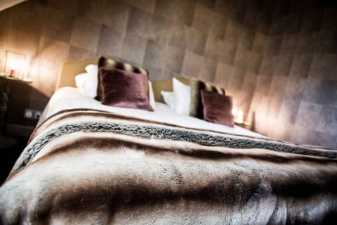 Suite | Pillowtop beds, minibar, in-room safe, individually decorated