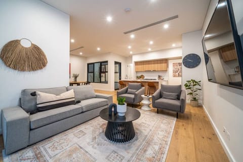 Enjoy an easy flow between living, dining, and kitchen spaces, making it simple to relax or spend time together.