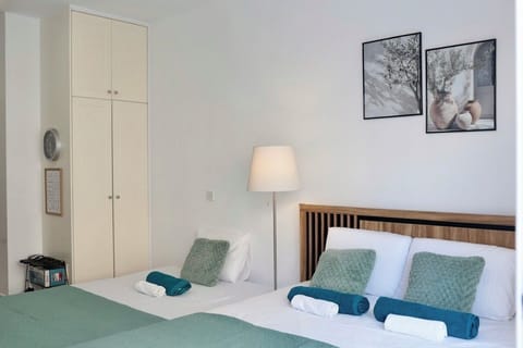 The sleeping area, including one 1,6x2m  double bed and sofa bed. 