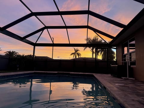 Beautiful sunsets in the back yard. Property is across the street from a canal