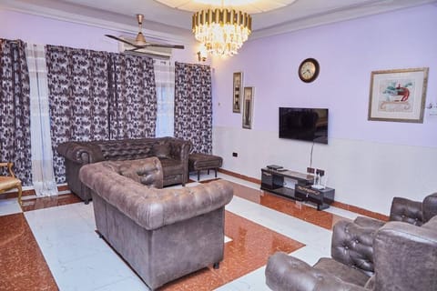 Deluxe Double Room | Living area | TV