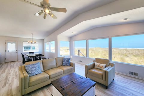 Light and airy with views of the sand and sea.