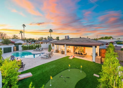 Fun 4 hole mini putting green, plenty of loungers and covered outdoor patio