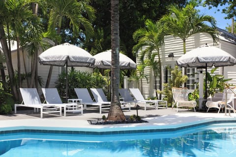 Outdoor pool, open 8:00 AM to 10:00 PM, sun loungers