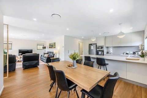 Modern furnishing includes a 7-piece dining suite.