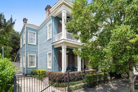 Front of House with Two Gated Parking Spaces