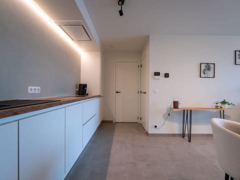 Interior Design, Flooring, Wall, Wood, Ceiling, Furniture, Floor, Countertop, Light Fixture, Lighting