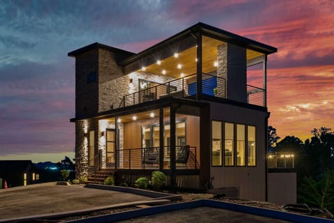 Enjoy breathtaking sunset views from this modern Sevierville retreat!