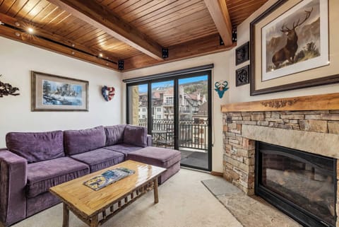 Cozy living area with sectional sofa and Smart TV