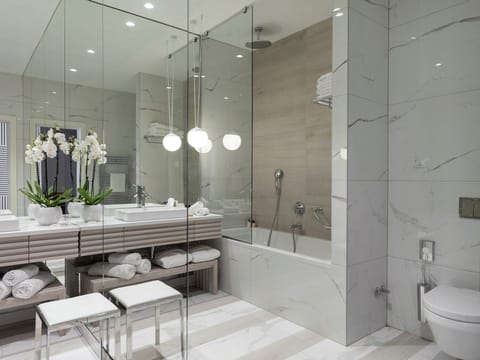 Eco-friendly toiletries, hair dryer, bathrobes, slippers