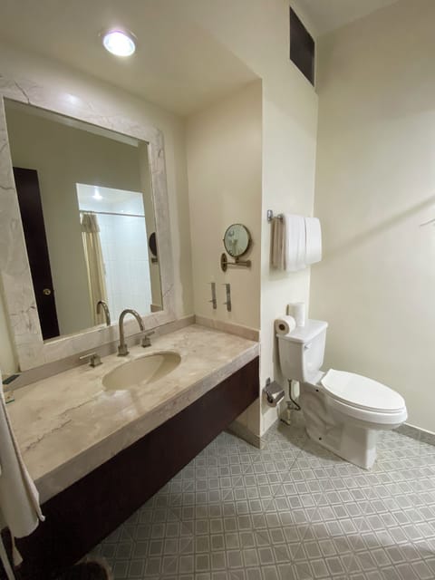 Shower, rainfall showerhead, towels, soap