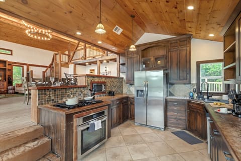 High-end custom kitchen with stainless steel appliances and great views.