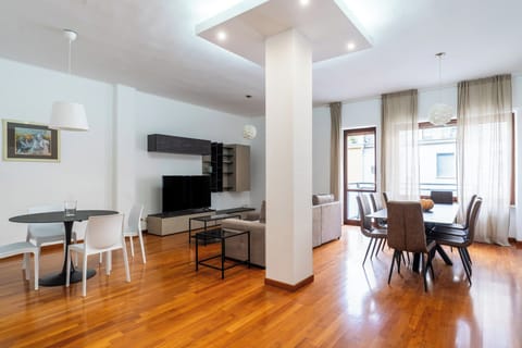 Standard Apartment, 4 Bedrooms (Apartment) | Living area | 30-inch TV with satellite channels