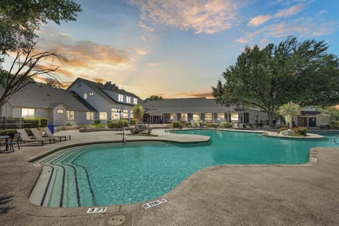 Dive into the resort-style pool at sunset!