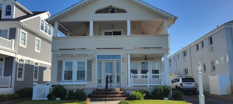 large wrap-around balcony with ocean view