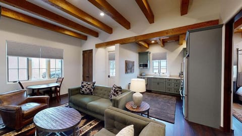 High ceiling open living room and kitchen space