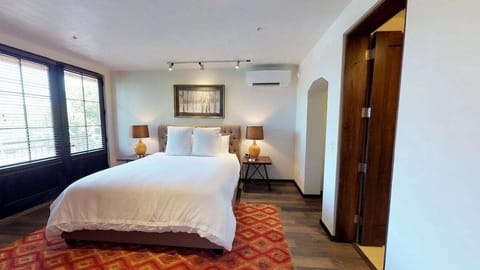Spacious bedroom with private balcony
