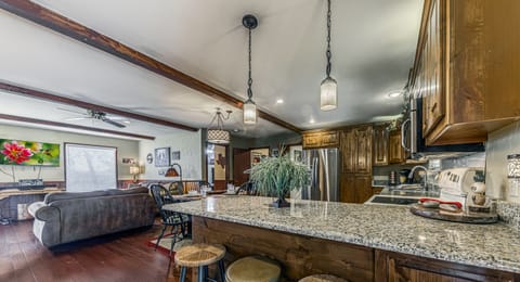 Entry open to kitchen and dining