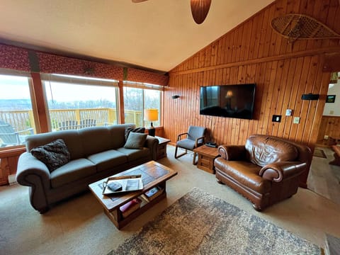 Relax in the cozy living room with beautiful views