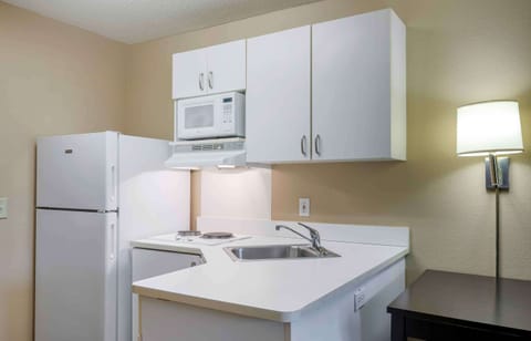 Studio, 1 Queen Bed, Non Smoking | Private kitchen | Full-size fridge, microwave, stovetop