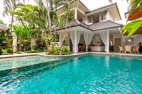 Private 2-meter deep pool with sunbeds at Villa Eindra Seminyak