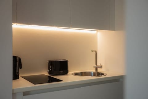 Deluxe Double or Twin Room, Pool View | Private kitchenette | Mini-fridge, stovetop, cookware/dishes/utensils