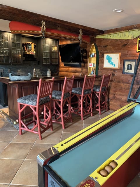 Arcade Escape to Wisconsin north woods bar.