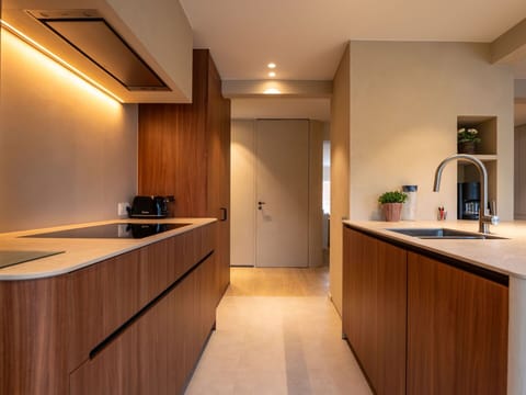 Interior Design, Flooring, Countertop, Wood, Kitchen, Floor, Cabinetry, Ceiling, Kitchen Appliance, Room