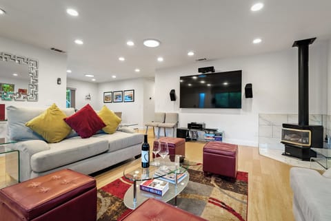 Large sectional and fireplace anchor this relaxed living room
