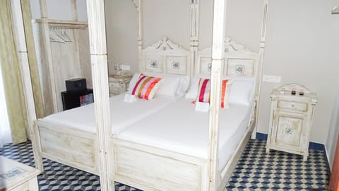 Down comforters, free minibar items, in-room safe, blackout drapes