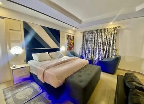Family Apartment, Balcony, City View | In-room safe, desk, laptop workspace, blackout drapes