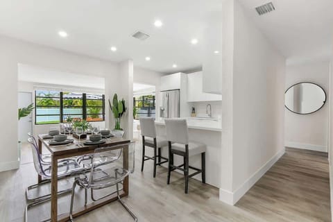 Modern kitchen and dining area.