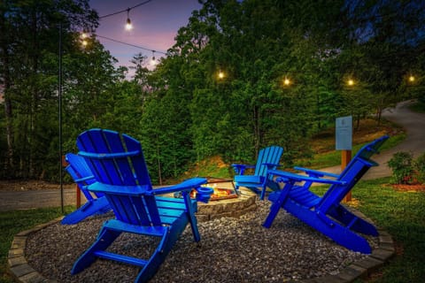 Twilight kisses the pines as we toast s’mores by the fire