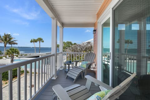 Relax on the private balcony with Adirondack chairs and beautiful Indian River v