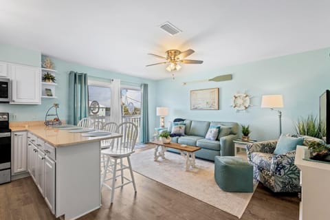 Updated living space with a coastal vibe. Sleeper sofa and a private balcony.
