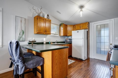 Cook with a view of the calm, sunlit lake
