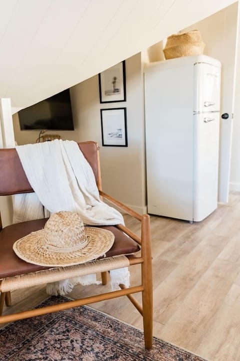 Cozy reading nook with second tv located off of the living room 