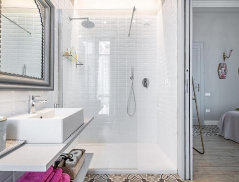 Junior Twin Room, City View | Bathroom | Shower, rainfall showerhead, hair dryer, bathrobes